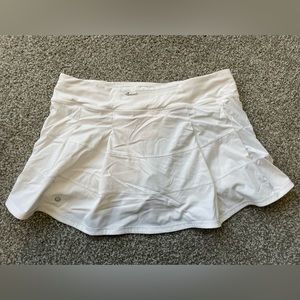 White Lululemon tennis skirt with spandex, Size 12 tall